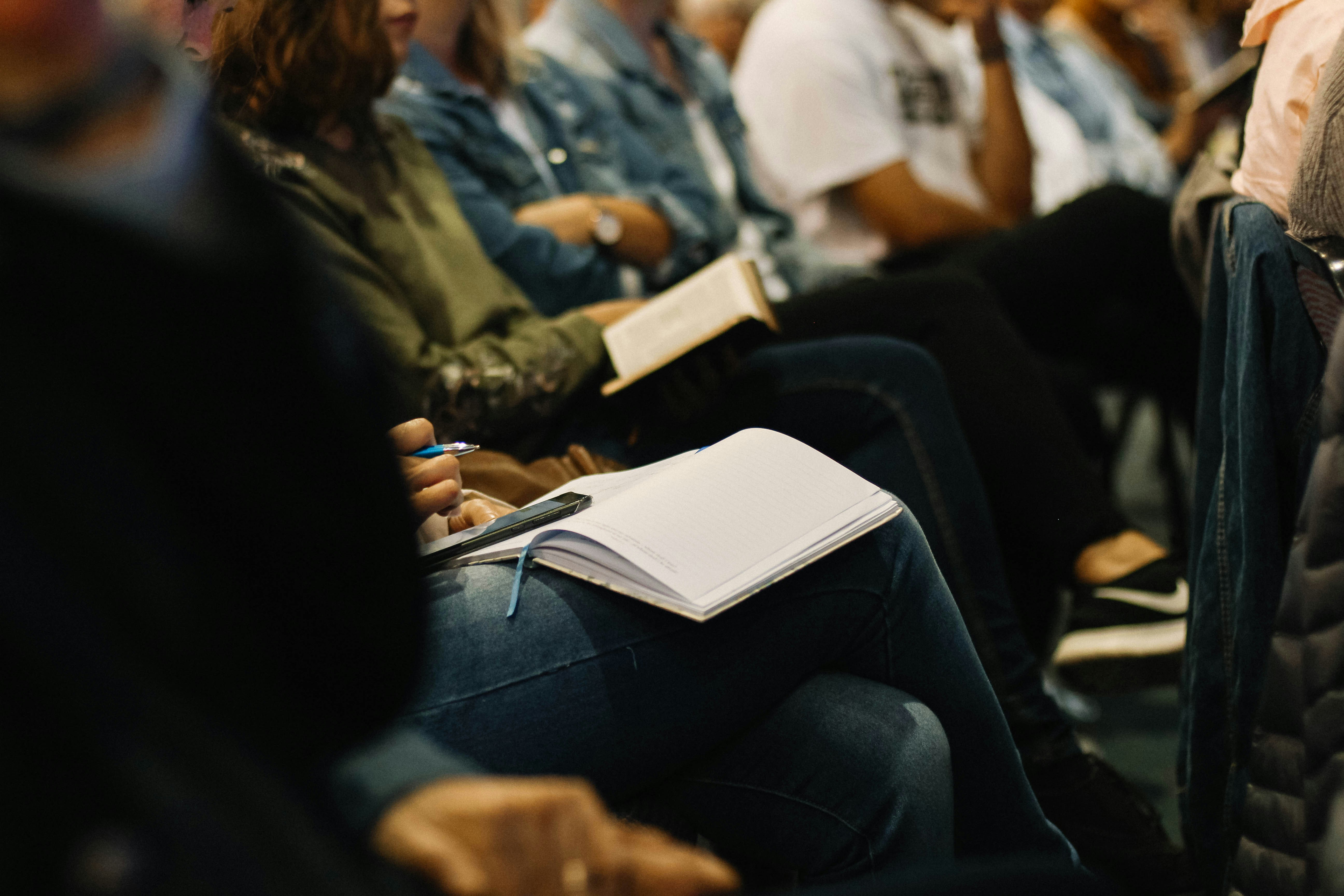 group of people studying their bibles
